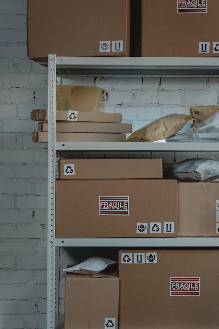 Mastering the First Impression: Your intriguing post title goes here Organized cardboard boxes labeled 'Fragile' in warehouse setting for shipping and logistics.